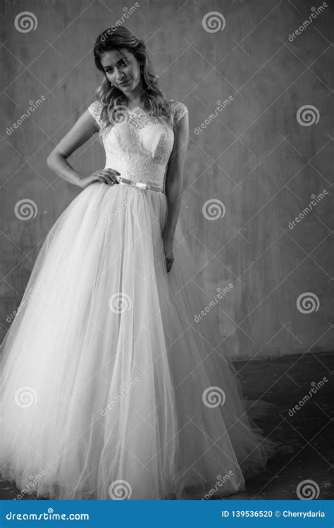 Beautiful Blonde Bride Woman In A Gorgeous Wedding Dress Fashion