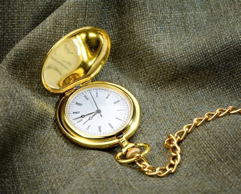 Golden Pocket Watch On Glass With Reflection Stock Photo Image Of