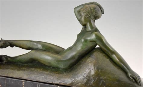Art Deco Bronze Sculpture Of A Reclining Nude With Goats Deconamic