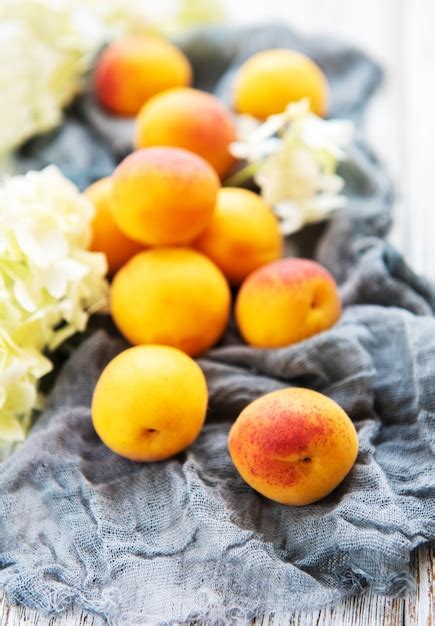 Premium Photo | Fresh apricots on a table