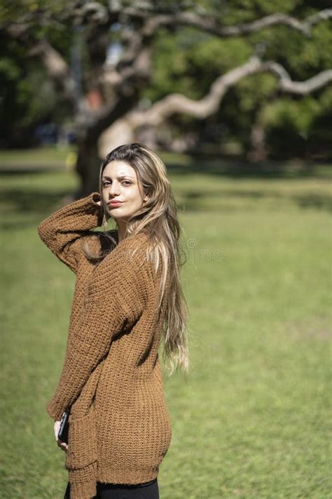 Portrait Of Blonde Woman Posing In A Park Stock Image Image Of Beautiful Outdoors 305974103