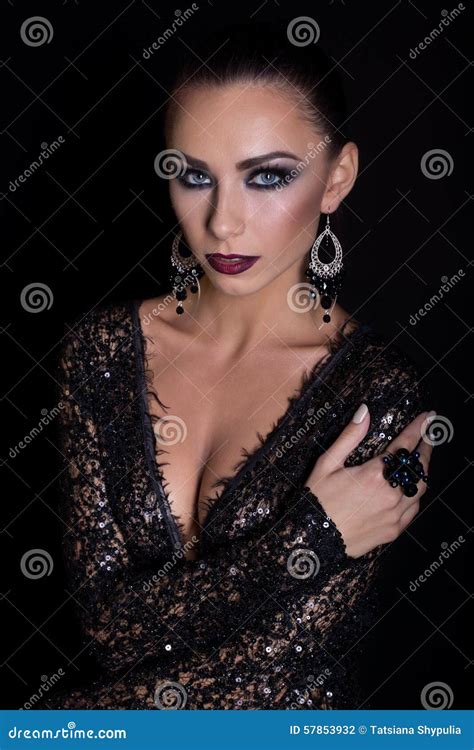 Expensive Jewelry Wreath Earrings And Ring On A Beautiful Elegant Brunette Girl With A Bright