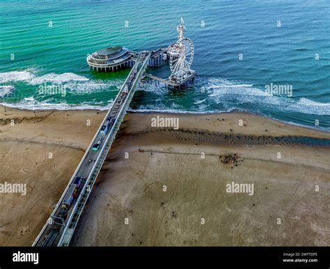 aerial view   bustling pier extending   sea  attractions