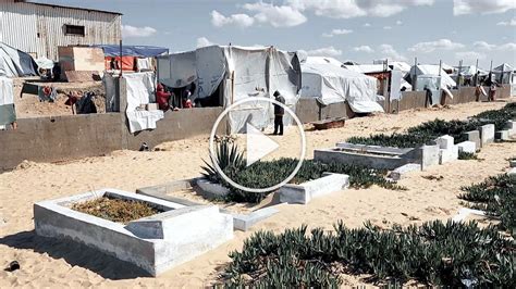 Displaced Palestinian Families Seek Shelter In Rafah Cemetery