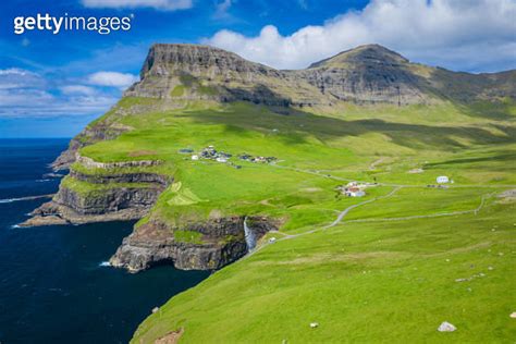 Aerial View Of Mulafossur Waterfall In Gasadalur Village In Faroe