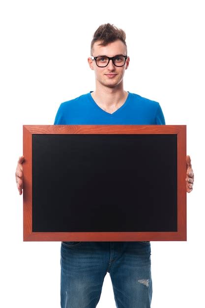 Free Photo Friendly Man Holding Blank Blackboard