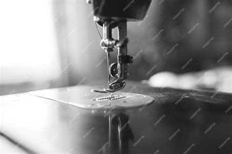 Premium Photo An Old Sewing Machine Stands On The Table At Home Ready