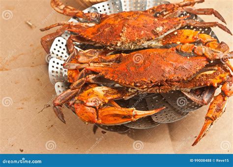 Colossal Steamed And Seasoned Chesapeake Blue Claw Crabs On A Brown