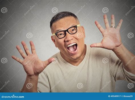Super Excited Funky Guy With Glasses Looking At You Arms Raised At
