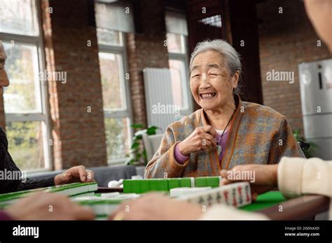Happy Old People Playing Mahjong Stock Photo Alamy