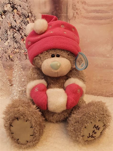 Tatty Teddy Holding Snowball