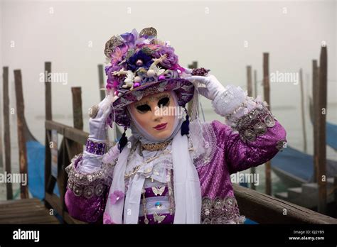 Posing In Carnival Costume And Mask During The Venice Carnival San