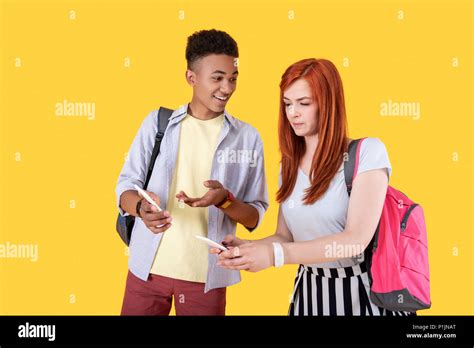 Nice Young People Using Their Smartphones Stock Photo Alamy