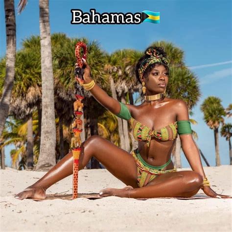 A Woman Sitting On The Beach With A Rope In Her Hand And Palm Trees