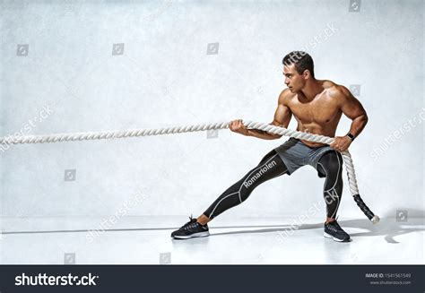 17826 Man Pulling Rope Immagini Foto Stock E Grafica Vettoriale