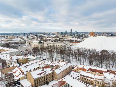 Beautiful Vilnius City Panorama In Winter With Snow Covered Houses