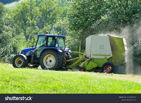 tractor pulling baler  lines dry stock photo  shutterstock