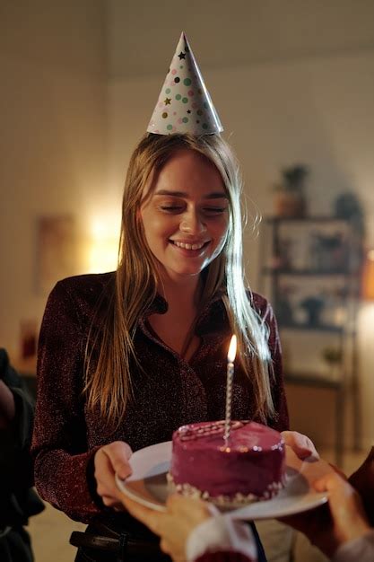 Premium Photo Happy Gorgeous Blond Girl Looking At Delicious Glazed Birthday Cake With Burning