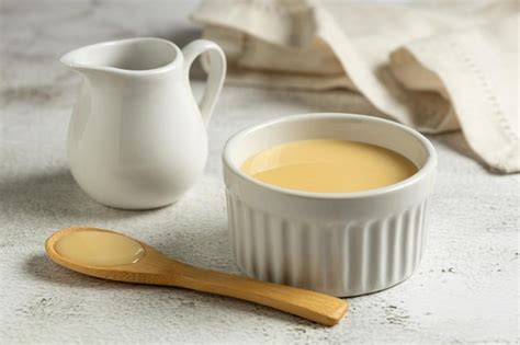 Premium Photo | Fresh condensed milk in the bowl