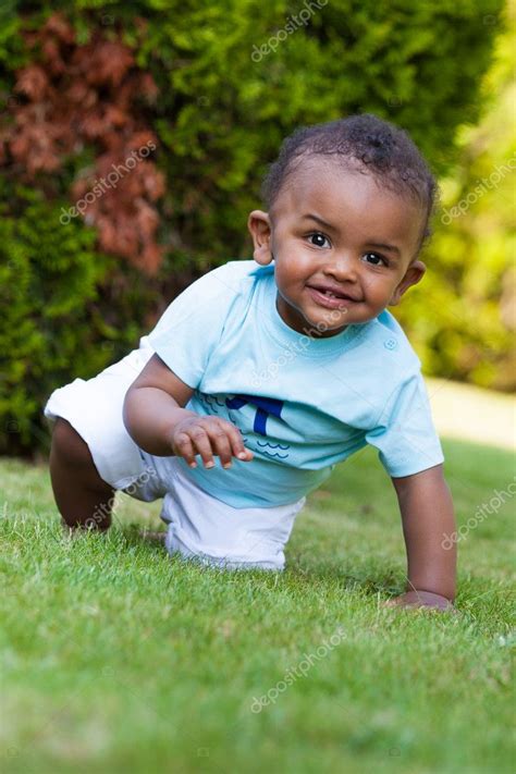 Little African American Baby Boy Playing In The Grass — Stock Photo