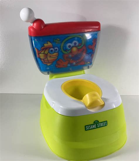 Kolcraft Sesame Street Elmo Adventure Potty Training Chair With Toilet