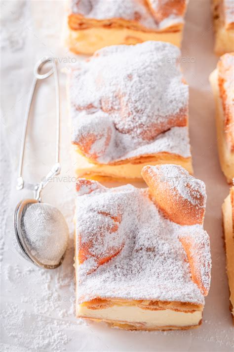 Homemade Karpatka Cake With Custard Cream And Powdered Sugar Stock