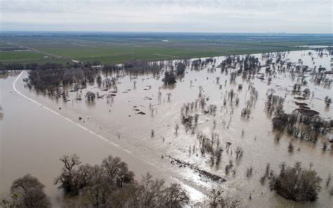 Climate Change Projected to Increase Atmospheric River Flood Damages in ...