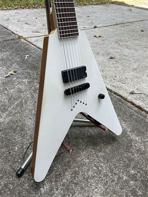 Custom 7 String V With Ibanez Neck Reverb