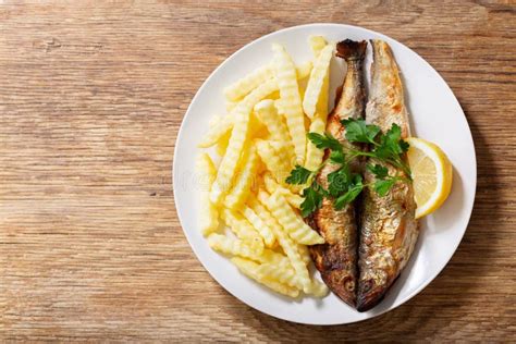 Plate Of Fried Fish With French Fries Top View Stock Photo Image Of