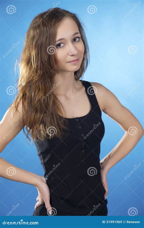 Brunette Teen With Arms Akimbo Royalty Free Stock Images Image 31991969