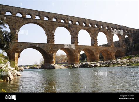 The Pont Du Gard The Famous Roman Aqueduct Across The River Gardon In