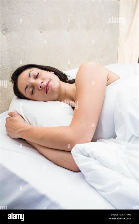 Pretty Brunette Sleeping On Bed Stock Photo Alamy