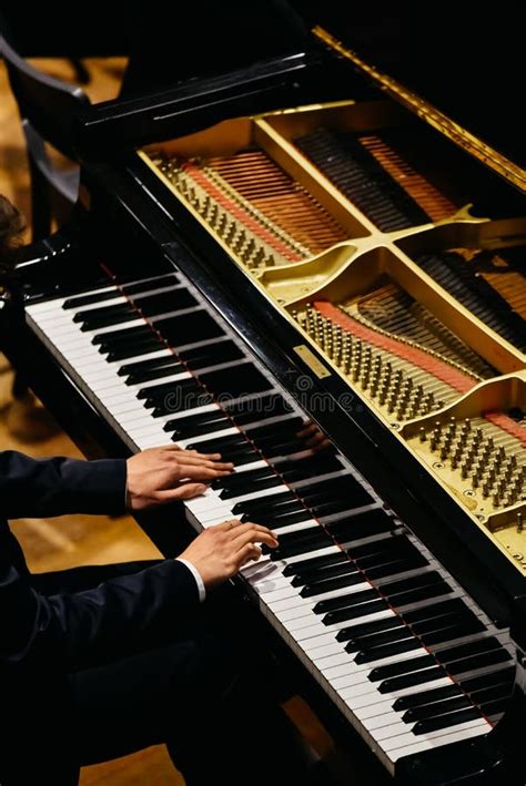 Hands of Classical Pianist Playing His Piano during a Concert Stock ...