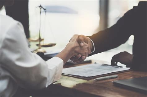 Premium Photo Business Person And Lawyer Shaking Hand After