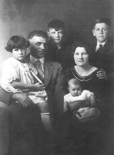 Parents Anthony And Louise With Sons Peter And Louis Standing Next To