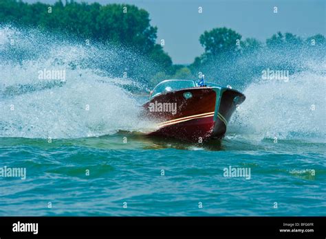 Classic Wooden Power Boat Riva Super Florida With High Speed Leaving