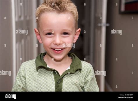 Happy Five Year Old Boy Smiles At The Camera Stock Photo Alamy