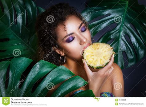 Close Up Of Afro American Beautiful Girl Posing In Tropical Forest