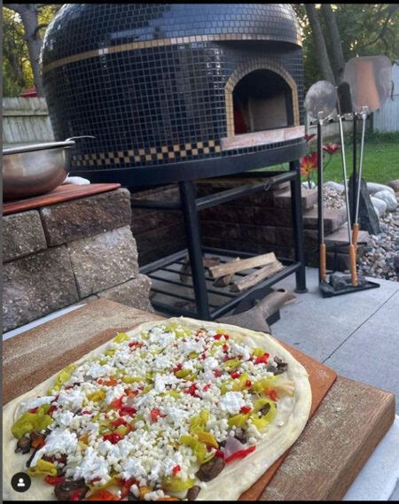 Virtuoso Pizzaiolo with his Vesuvio Pizza Oven - Forno Bravo. Authentic ...