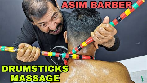 Asim Barber Using Drumsticks For Shoulder Massage Head And Body Massage