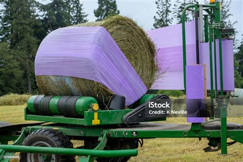 Silage Being Prepared In A Round Bale Wrapper Stock Photo Download