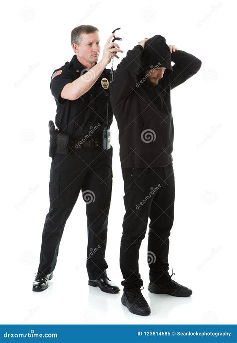 Police: Officer Puts Handcuffs on Criminal Stock Image - Image of ...