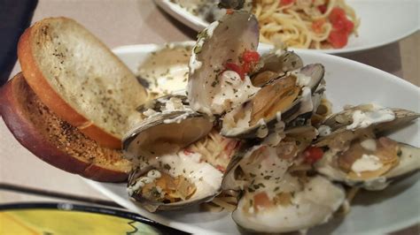 Cherry stone clams in wine sauce with parmesan drizzle over linguine ...