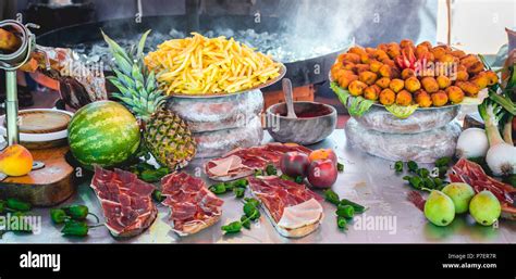 Delicious tasty street food at a market in Spain Stock Photo - Alamy