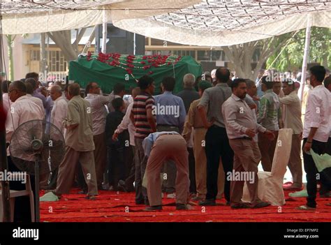 People from Ismaili Community are carrying coffin after funeral prayer ...