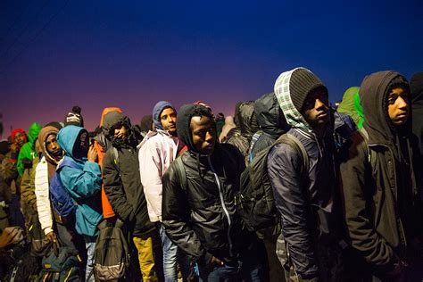 Calais Migrant Crisis Refugees Begin Leaving Jungle Camp After Night