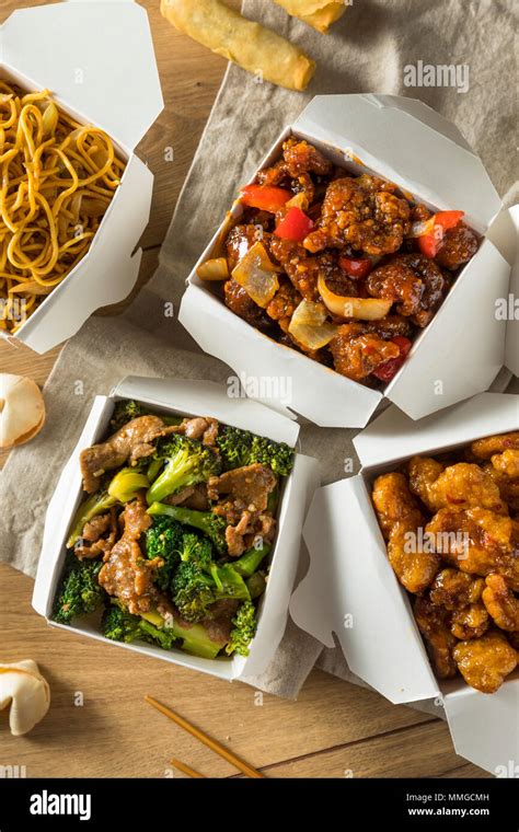 Spicy Chinese Take Out Food With Chopsticks And Fortune Cookies Stock