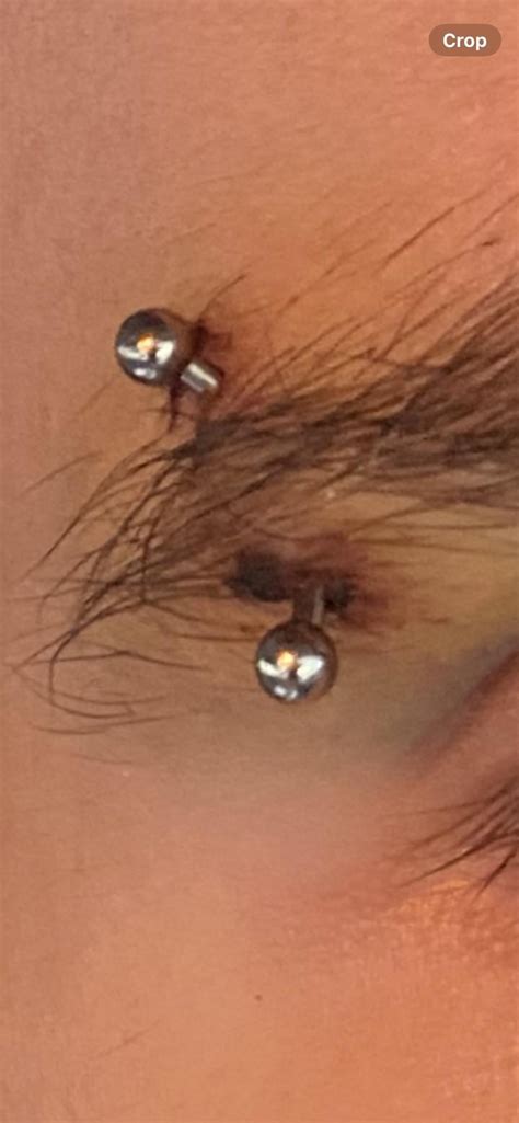 Is my eyebrow piercing healing okay? : r/piercing