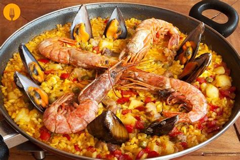 Como Hacer Una Paella EspaÑola De Pescado Y Marisco Receta Rica Y Facil Sabroso Arroz