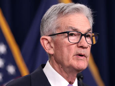 Federal Reserve Holds Interest Rates Steady Projects Three Rate Cuts